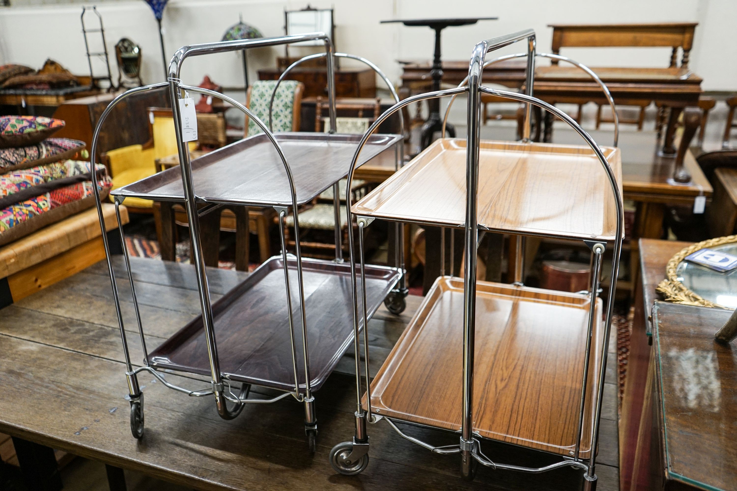 Two mid century Gerlinol Breshley Dinett chrome folding tea trolleys, length 66cm, depth 41cm, height 78cm